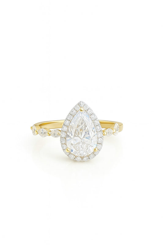 The Radiant Teardrop Halo Ring